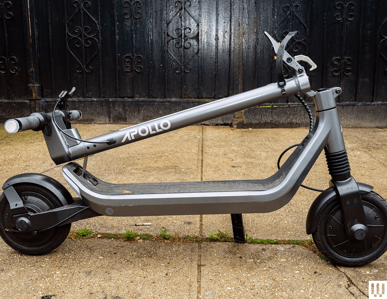 Side view of Apollo Go electric scooter with the handle bar folded down