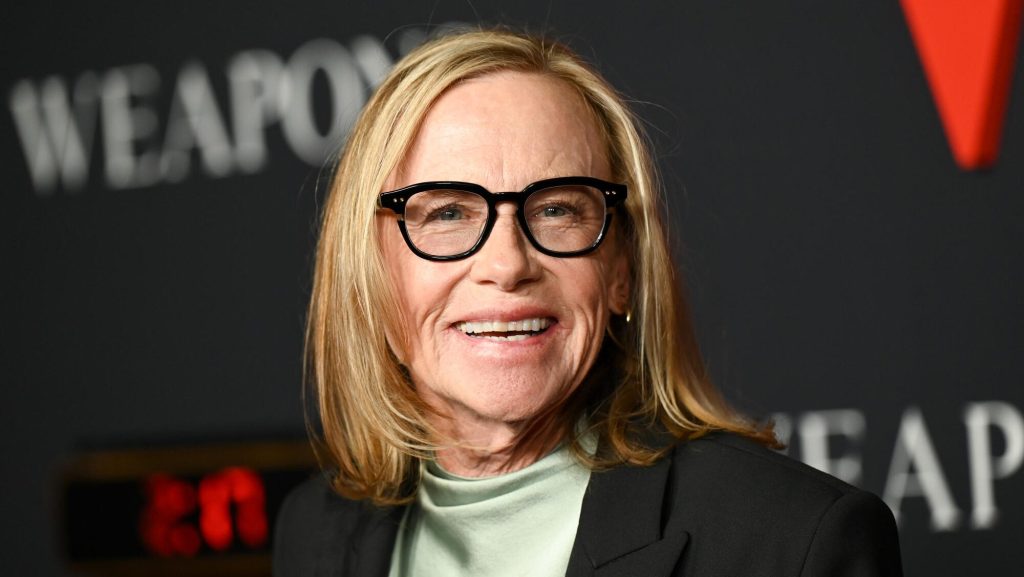 ‘Weapons’ Star Amy Madigan On Aunt Gladys Origin & Prequel